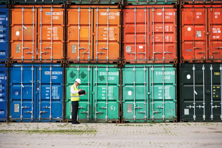 a-customs-inspector-standing-and-reviewing-a-tack-2026-01-09-10-57-43-utc