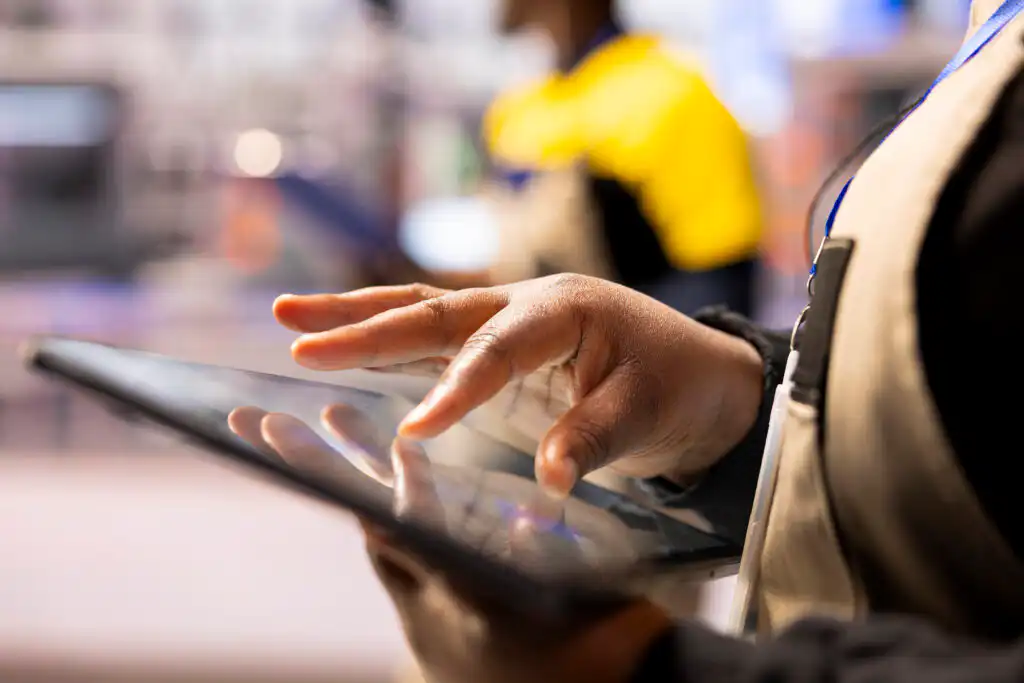 close up engineer using tablet